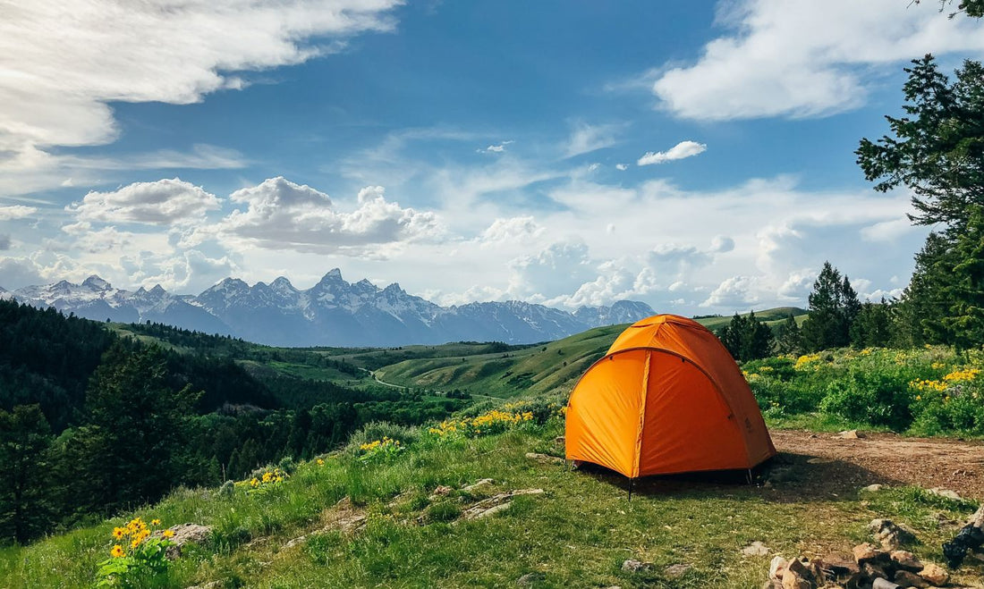 View of tent overlooking mountains