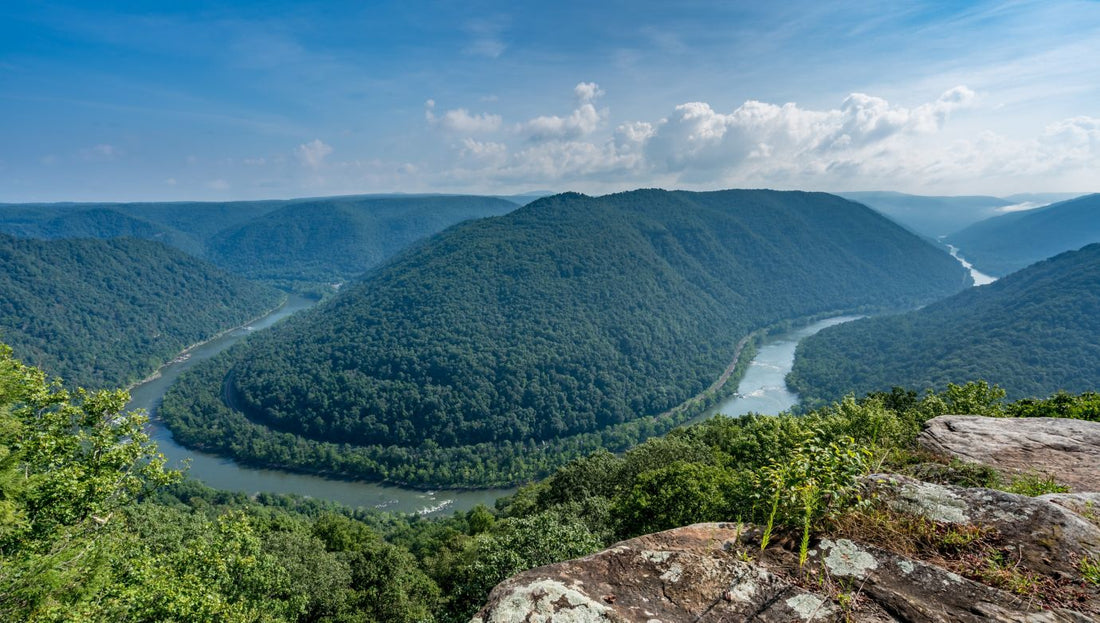 view of mountain and river bend