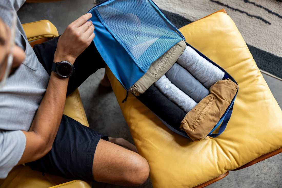 How To Fold & Roll Clothes For Packing: Rolling vs Folding | Eagle Creek How To Fold & Roll Clothes For Packing: Rolling vs Folding | Eagle Creek